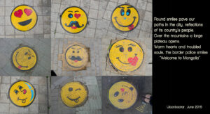 manholes decorated with yellow smiley faces