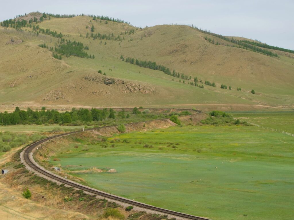 train tracks and mountains